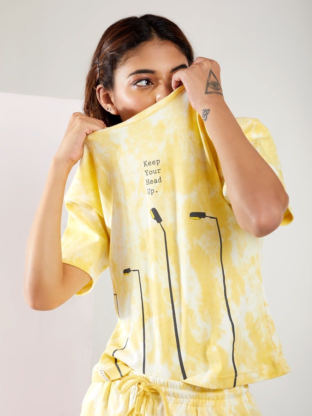 white and yellow tie dye shirt