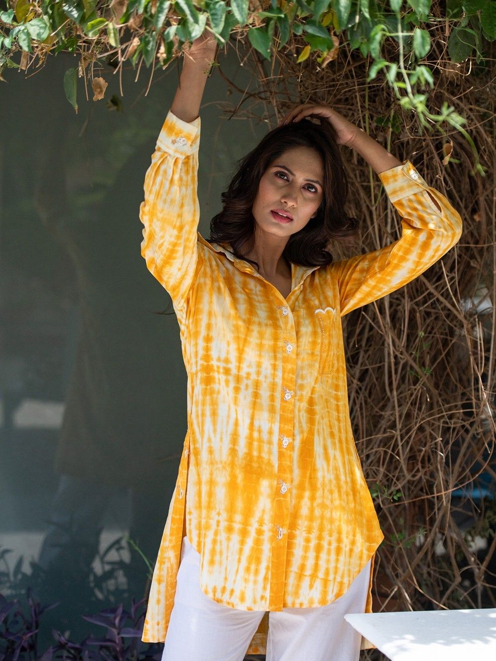 white and yellow tie dye shirt
