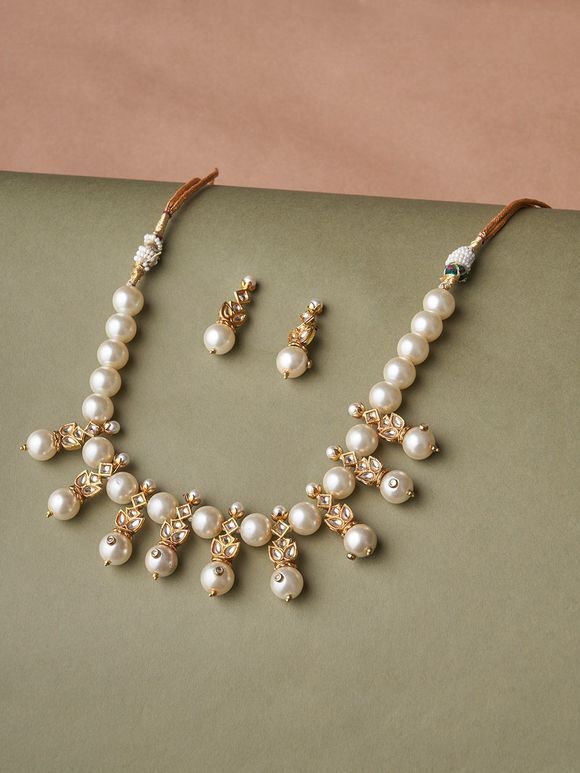 Gold Toned Handcrafted Metal Kundan Pearl Necklace with Earrings- Set of 2