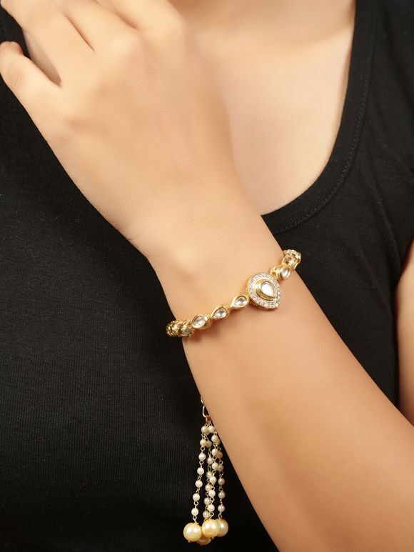 Gold Toned Handcrafted Metal Kundan Bracelet